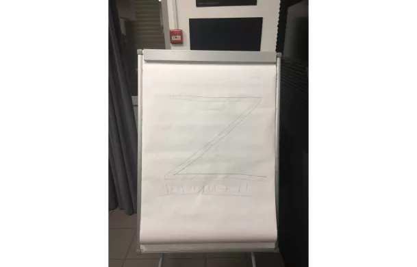 The letter Z drawn on the flipchart in Memorial office after the search