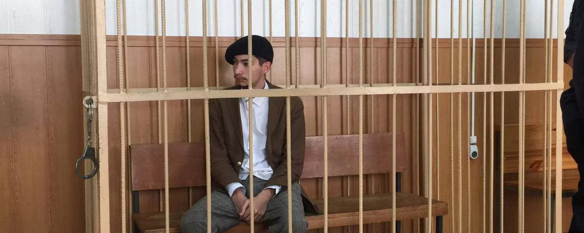 Акциониста Павла Крисевича отправили в СИЗО из-за перформанса в поддержку политзаключенных