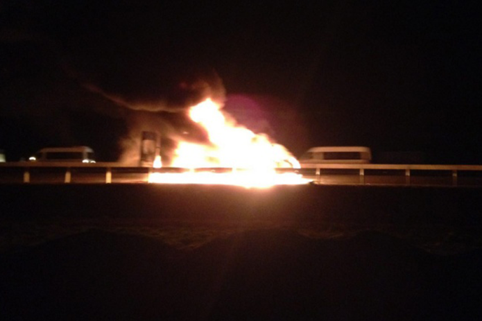 Burning bus with journalists and human rights activists attacked on the border of Ingushetia and Chechnya, March 9, 2016 / Photo: Egor Skovoroda, Mediazona