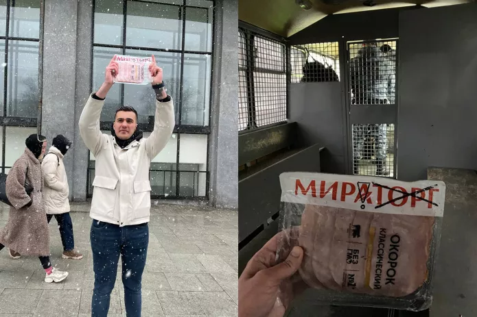 A young man on a picket with Miratorg sausage / “Mir” means “peace” in Russian / Photo: Avtozak Live