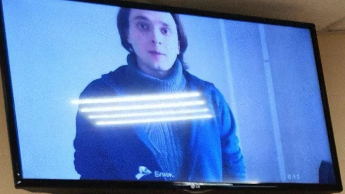 <em>Alexander Demidenko in a court by video conference, 2023 / Photo: Свободные Люди Воронежа Telegram-channel</em>