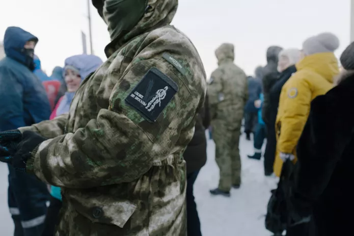 [Text on the patch: «We don’t leave our own behind!»]